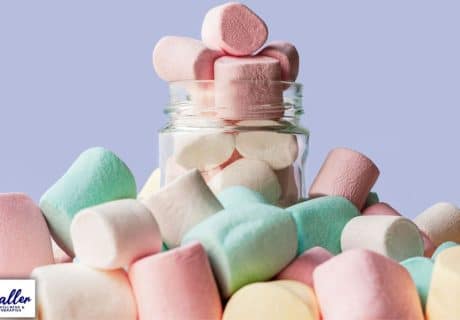 marshmallows in a glass jar to illustrate an article about willpower, and how to get more of it