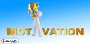 figure holding up a trophy to illustrate an article on motivation
