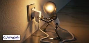 image of a lightbulb pugging itself in to illustrate an article on creativity