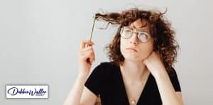image of a woman trying to remember something to illustrate an article on stress and memory loss