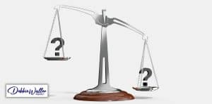 images of a set of balance scales holding question marks, to illustrate an article about uncertainty