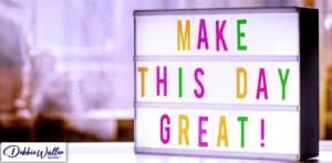 a sign saying Make This Day Great to illustrate an article on boosting confidence