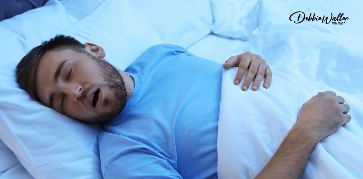 A man fast asleep and enjoying good rest.