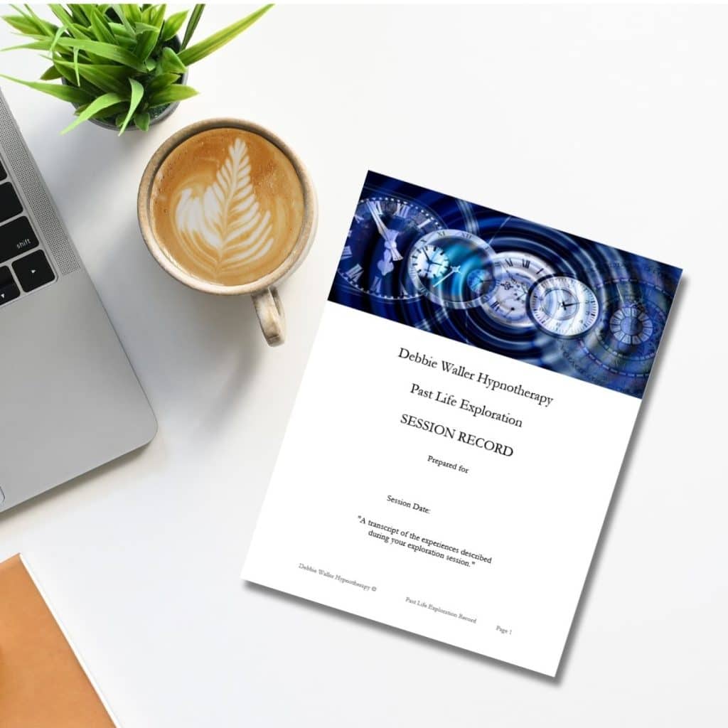 An image of a desk, with a plant and coffee next to a printed report of a past life experience with debbie waller hypnotherapy